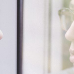 man seeing image of searching for the real you