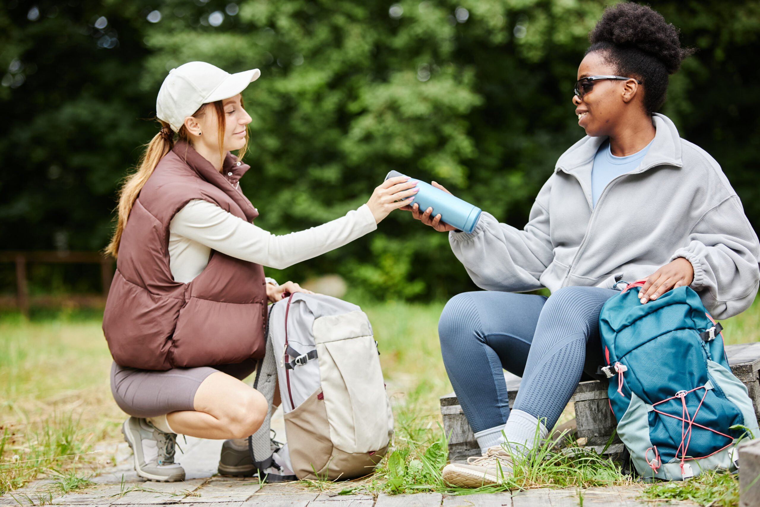 7 Bible Verses about Generosity-a woman journaling at a table with coffee and flowers