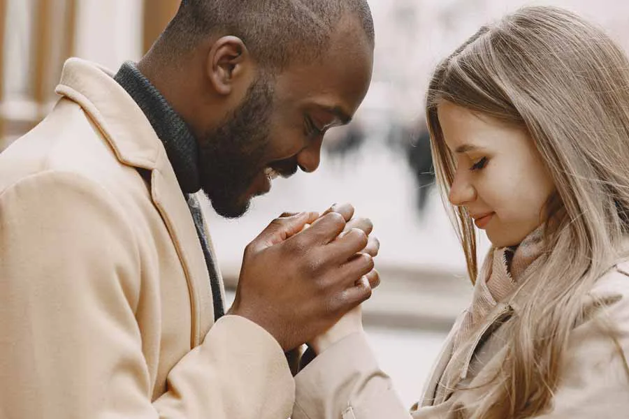 A young couple spending time together outside in the spring