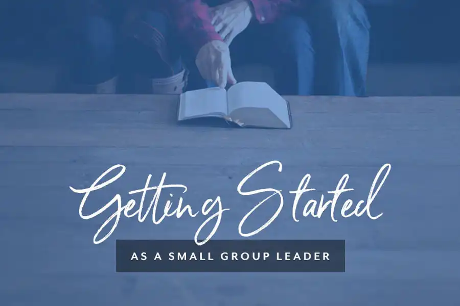 Text reading "Getting Started as a Small Group Leader" over an image of two people reading a Bible.
